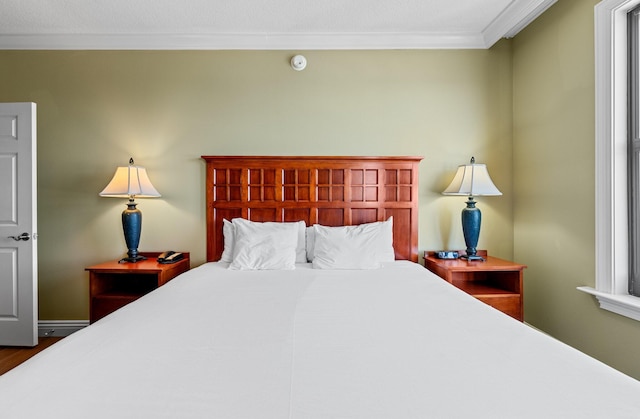 bedroom featuring ornamental molding