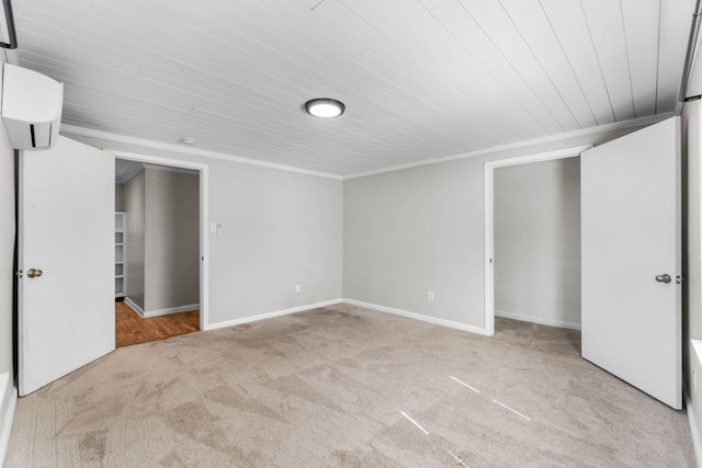 unfurnished bedroom featuring ornamental molding, carpet, and baseboards