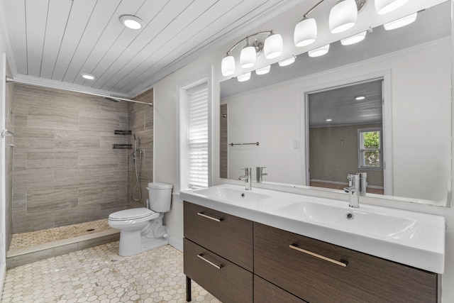 bathroom with ornamental molding, a sink, and toilet