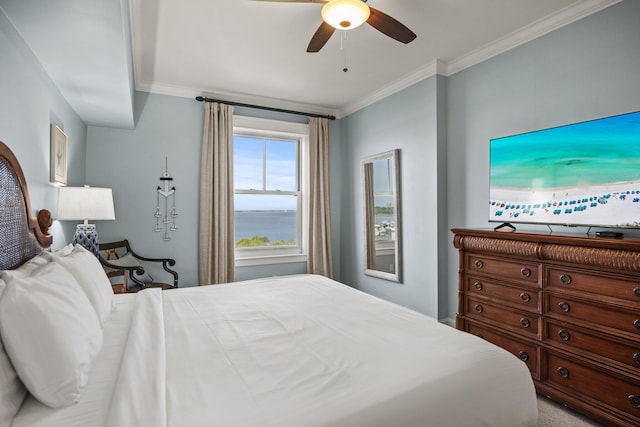 bedroom featuring a ceiling fan and ornamental molding