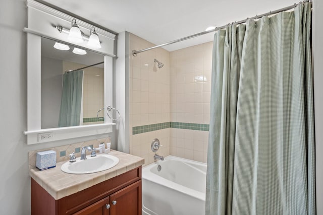 full bath featuring vanity and shower / bathtub combination with curtain