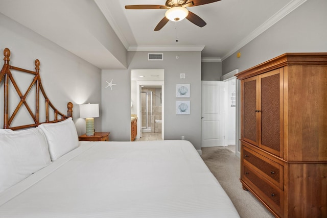 bedroom featuring visible vents, ornamental molding, light colored carpet, connected bathroom, and a ceiling fan