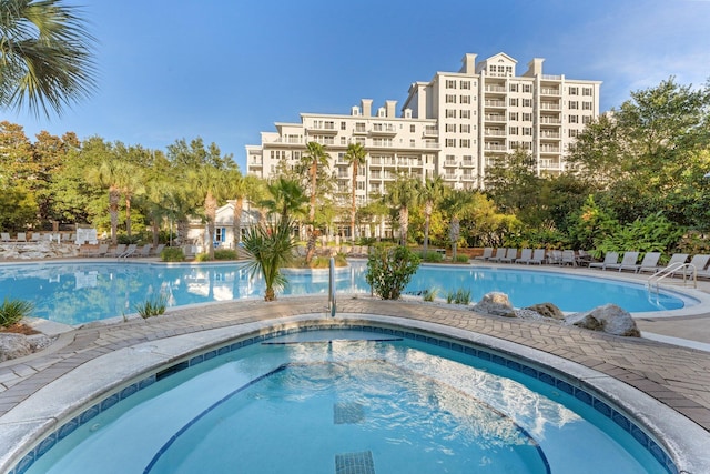 pool featuring a community hot tub