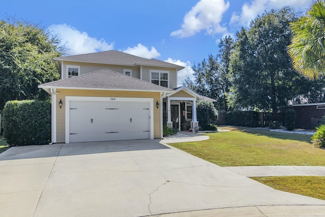 view of front of house featuring roof with shingles, concrete driveway, fence, a garage, and a front lawn