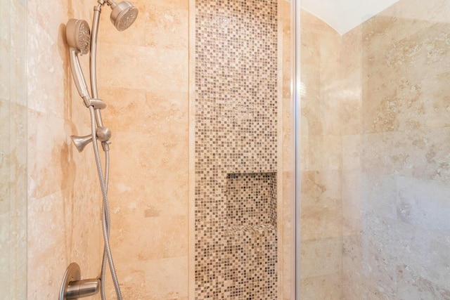 room details featuring a shower stall