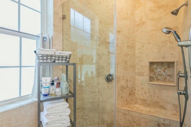 bathroom with a shower stall