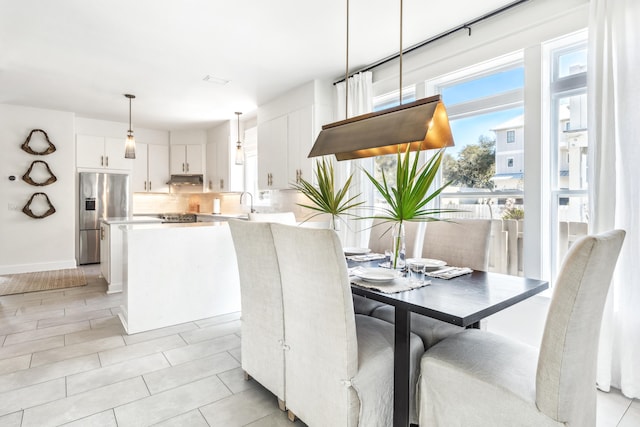 dining room with baseboards