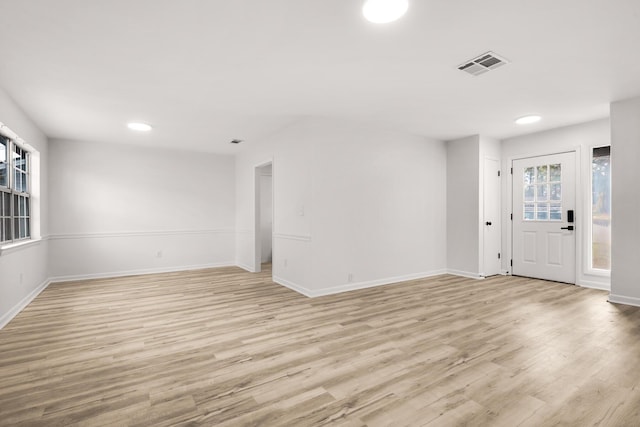 entrance foyer with light wood-style flooring, visible vents, baseboards, and recessed lighting