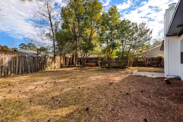 view of yard featuring a fenced backyard