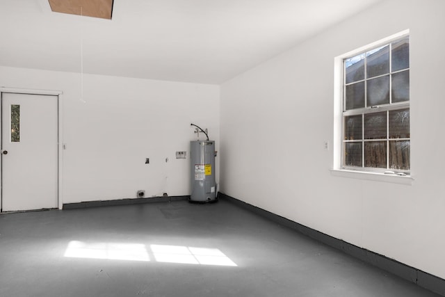 garage featuring electric water heater