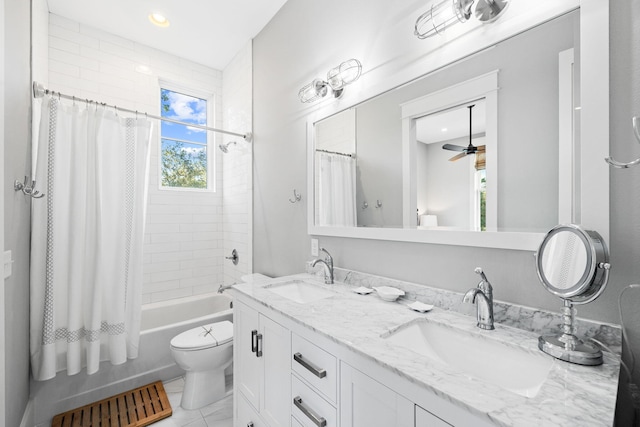 full bath with double vanity, toilet, a sink, and shower / tub combo with curtain