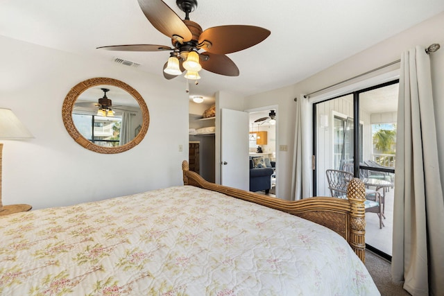 bedroom featuring access to outside, a ceiling fan, visible vents, and carpet floors