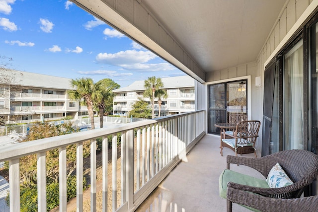 balcony featuring a sunroom