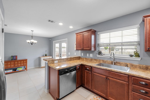 kitchen featuring french doors, stainless steel dishwasher, a sink, and a wealth of natural light