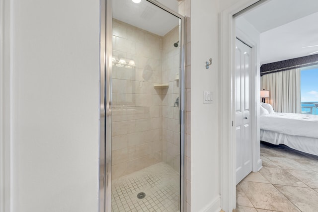 full bathroom with a stall shower and connected bathroom