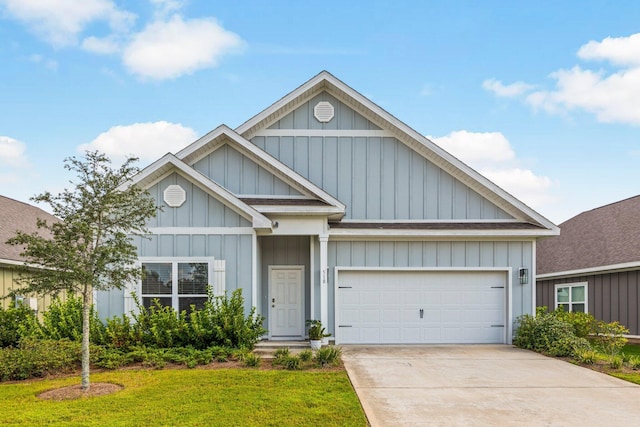 view of front facade with driveway, board and batten siding, and an attached garage