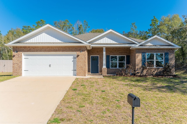 view of front of home with brick siding, roof with shingles, concrete driveway, a front yard, and a garage