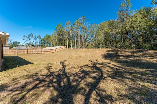 view of yard featuring fence