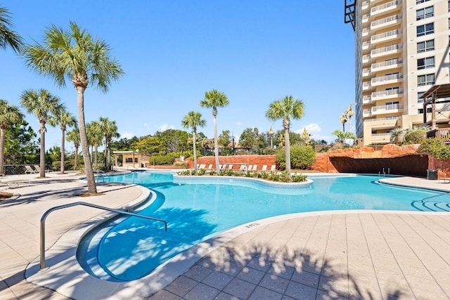 pool with a patio