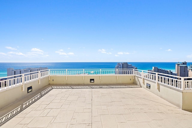 view of patio / terrace featuring a water view