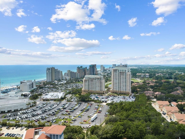 aerial view featuring a water view and a view of city