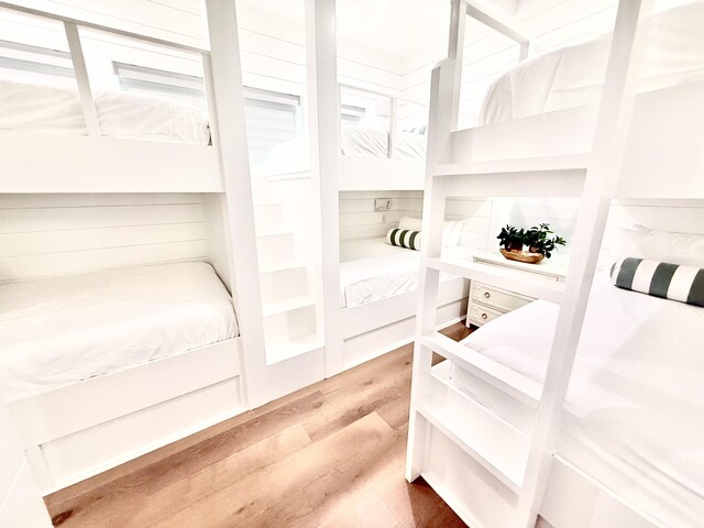 bedroom featuring wood finished floors