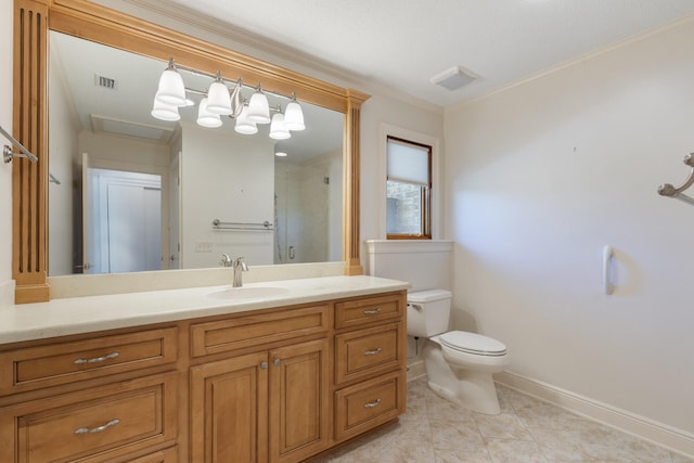 bathroom featuring visible vents, toilet, ornamental molding, baseboards, and vanity