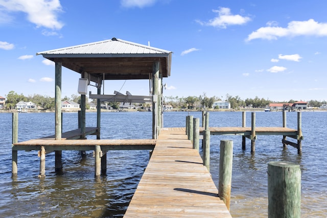 view of dock with a water view