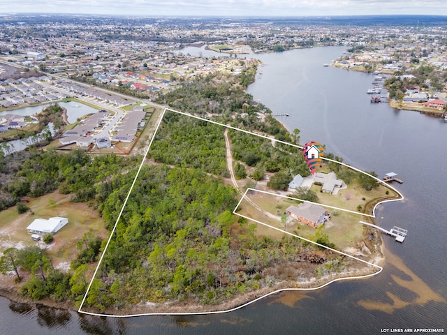 drone / aerial view featuring a water view