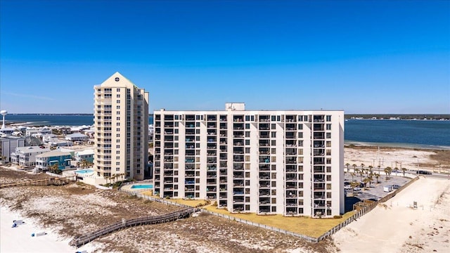 view of building exterior featuring a water view