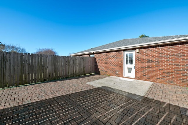 view of patio / terrace with fence