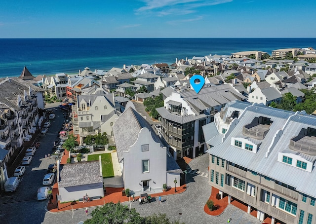 bird's eye view featuring a residential view and a water view