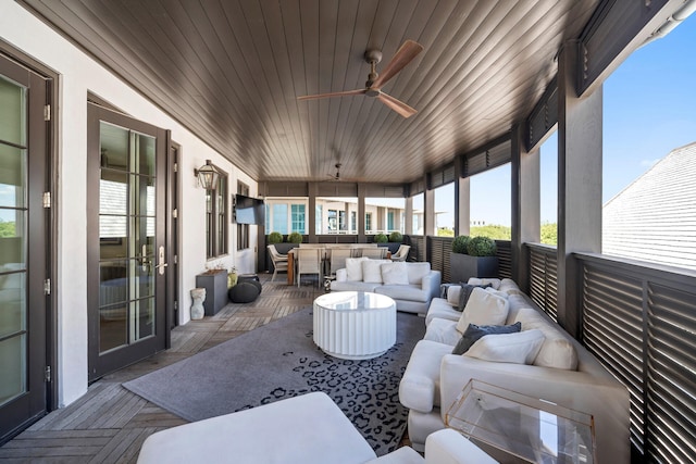 view of patio / terrace with ceiling fan and an outdoor hangout area