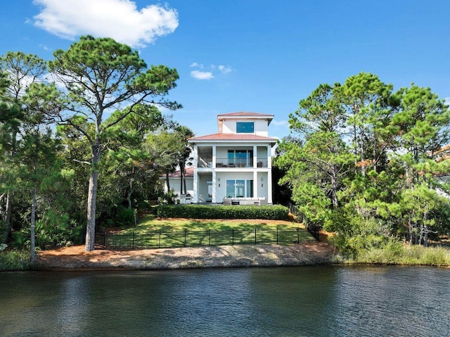 property view of water with a fenced front yard