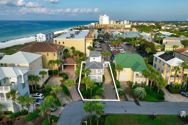 birds eye view of property featuring a water view and a residential view