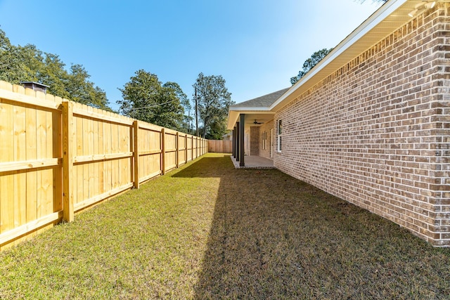 view of yard featuring a fenced backyard