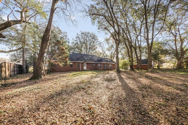 view of yard with fence