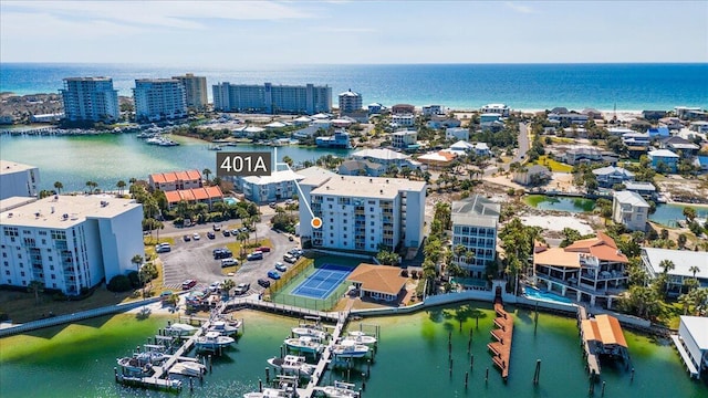 bird's eye view featuring a water view and a city view