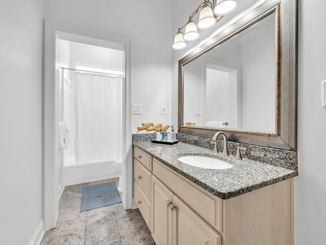 bathroom with toilet, baseboards, vanity, and shower / tub combo with curtain