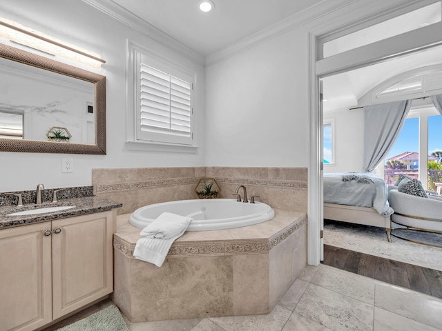 ensuite bathroom featuring a garden tub, connected bathroom, recessed lighting, vanity, and crown molding