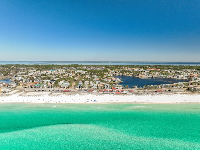 aerial view featuring a water view and a beach view