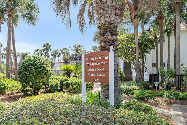 community sign with fence