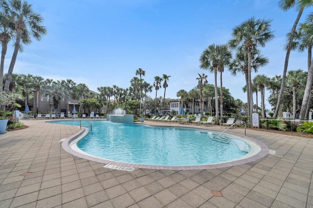 community pool featuring a patio area