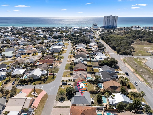 aerial view featuring a water view and a residential view