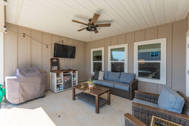 exterior space featuring ceiling fan and an outdoor hangout area