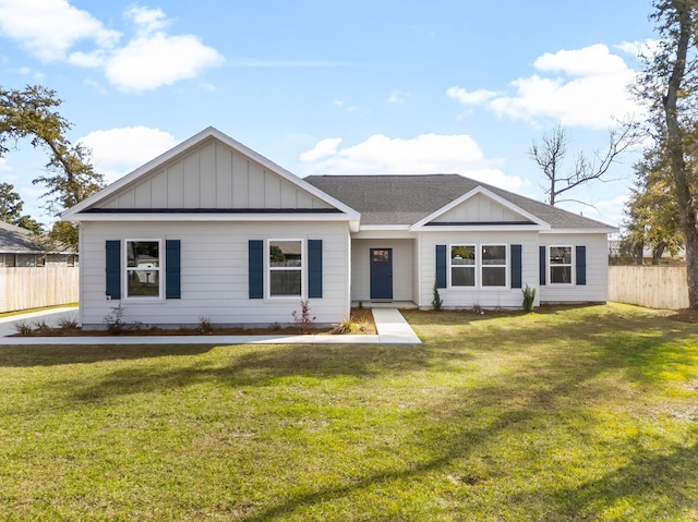 single story home with fence, board and batten siding, and a front yard