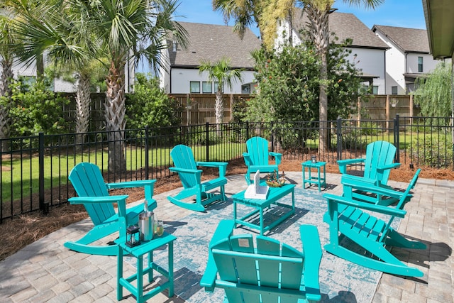38 Basswood Dr, Santa Rosa Beach, FL 32459 - view of patio / terrace with an outdoor fire pit and fence