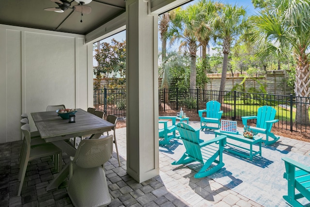 38 Basswood Dr, Santa Rosa Beach, FL 32459 - view of patio / terrace with a ceiling fan, outdoor dining area, and a fenced backyard