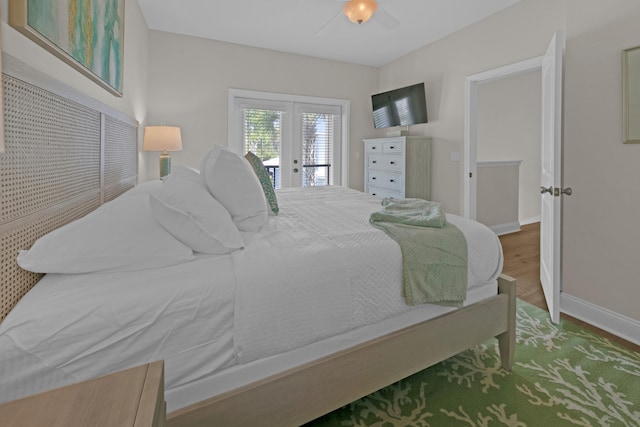 38 Basswood Dr, Santa Rosa Beach, FL 32459 - bedroom with access to exterior, french doors, a ceiling fan, wood finished floors, and baseboards