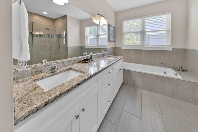 38 Basswood Dr, Santa Rosa Beach, FL 32459 - full bathroom featuring a sink, a shower stall, a bath, and double vanity